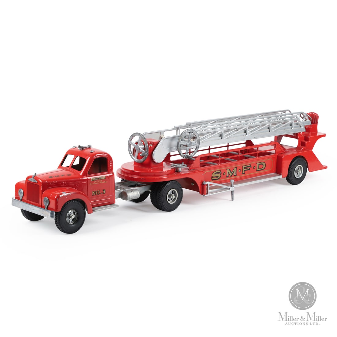 Smith-Miller SMFD No. 3 MACK Fire Truck: American. 1949-1952. Pressed steel. This toy has an unusual mark on the chassis, an "H" casting identity mark with some embellishments. When Bob Smith left Smith-Miller, Matt Miller was looking for a