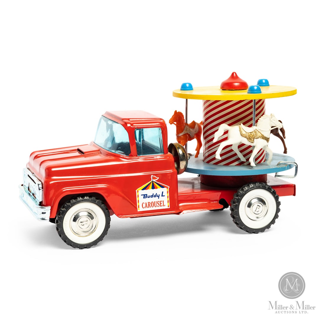 Buddy L "Merry-Go-Round" Carousel Truck: American. 1960s. Pressed steel. This Buddy L toy (Model No. 5429) was made in Canada under the brand name "L'il Beaver Toys & Trucks". L'il Beaver operated as a Canadian manufacturer that used