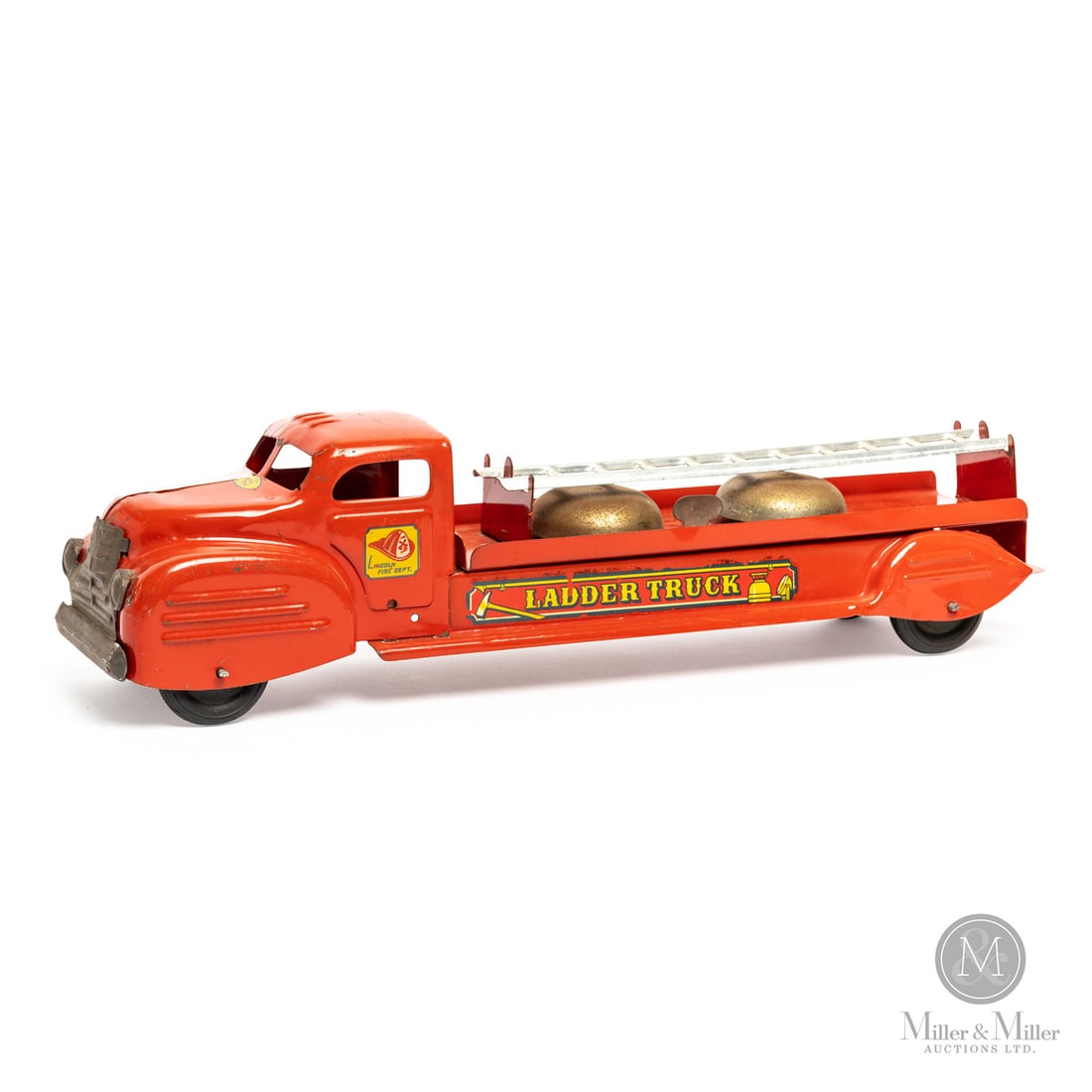 Lincoln Toys Ladder Truck: Canadian. 1946-Early 1950s. Pressed steel. This toy has a decal that says "Made in Canada Lincoln Toys Reg'd," which identifies Lincoln toys made from 1946 into the early 1950s, representing the forma
