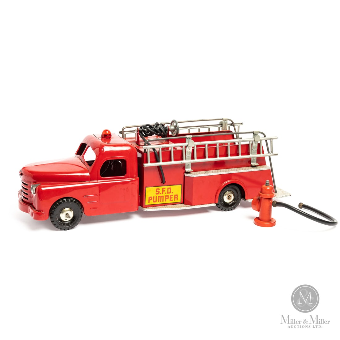 Structo Fire Department ("S.F.D.") Pumper Truck: American. 1950s. Pressed steel. Embossed, "Structo Toys", on tires. From the Yvan Lalonde Collection. Size 6" x 6" x 22". Condition Very good condition. Original paint and decals. Minor paint nicks. M