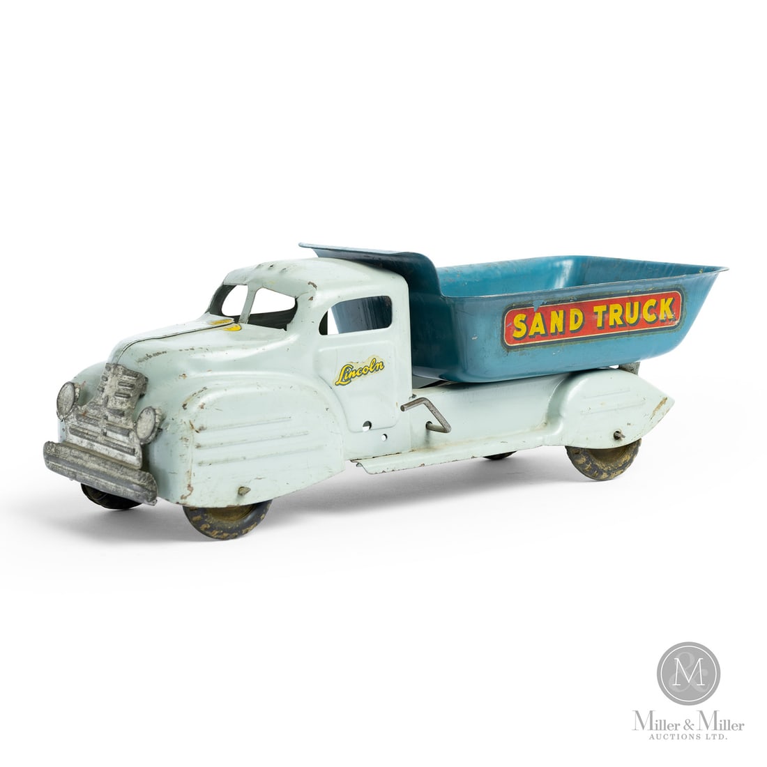 Lincoln Toys "Sand Truck" Dumper: Canadian. 1946-early 1950s. Pressed steel This toy has a decal that says "Made in Canada Lincoln Toys Reg'd," which identifies Lincoln toys that were made from 1946 to the early 1950s, representing th