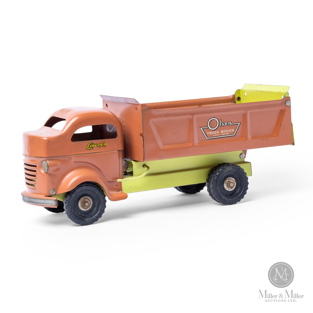 Lincoln Toys "Olson Truck Bodies" Dump Truck: Canadian. 1946-1948. Pressed steel. This toy is referred to as the "Olsen Label Mystery". The toy has a label that says "Made in Canada Lincoln Toys" which identifies Lincoln toys that were made