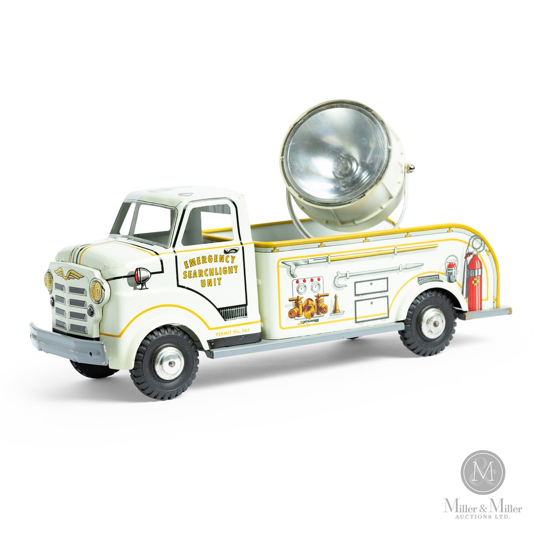 Marx Lumar Emergency Searchlight Unit Truck: American. 1950s. Lithographed tin. This truck was made by Louis Marx & Co. under the Lumar brand. It was part of a series of emergency service vehicles and is known for its distinctive, large