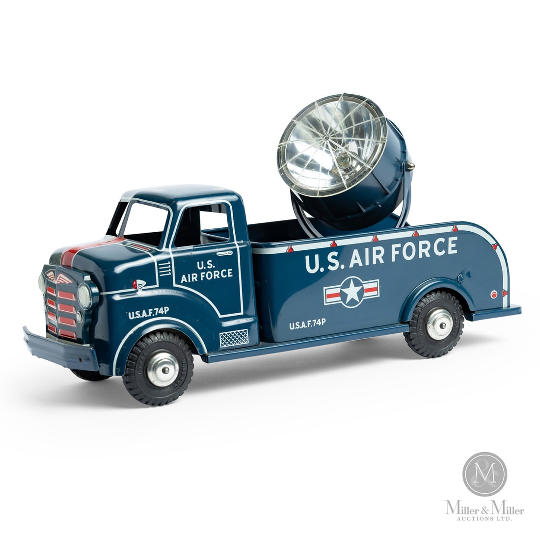 Marx Lumar U.S. Air Force Searchlight Truck: American. 1950s. Painted pressed steel with plastic searchlight. This truck was made by Louis Marx & Co. under the Lumar brand. It was part of a line of military-themed vehicles known for their large