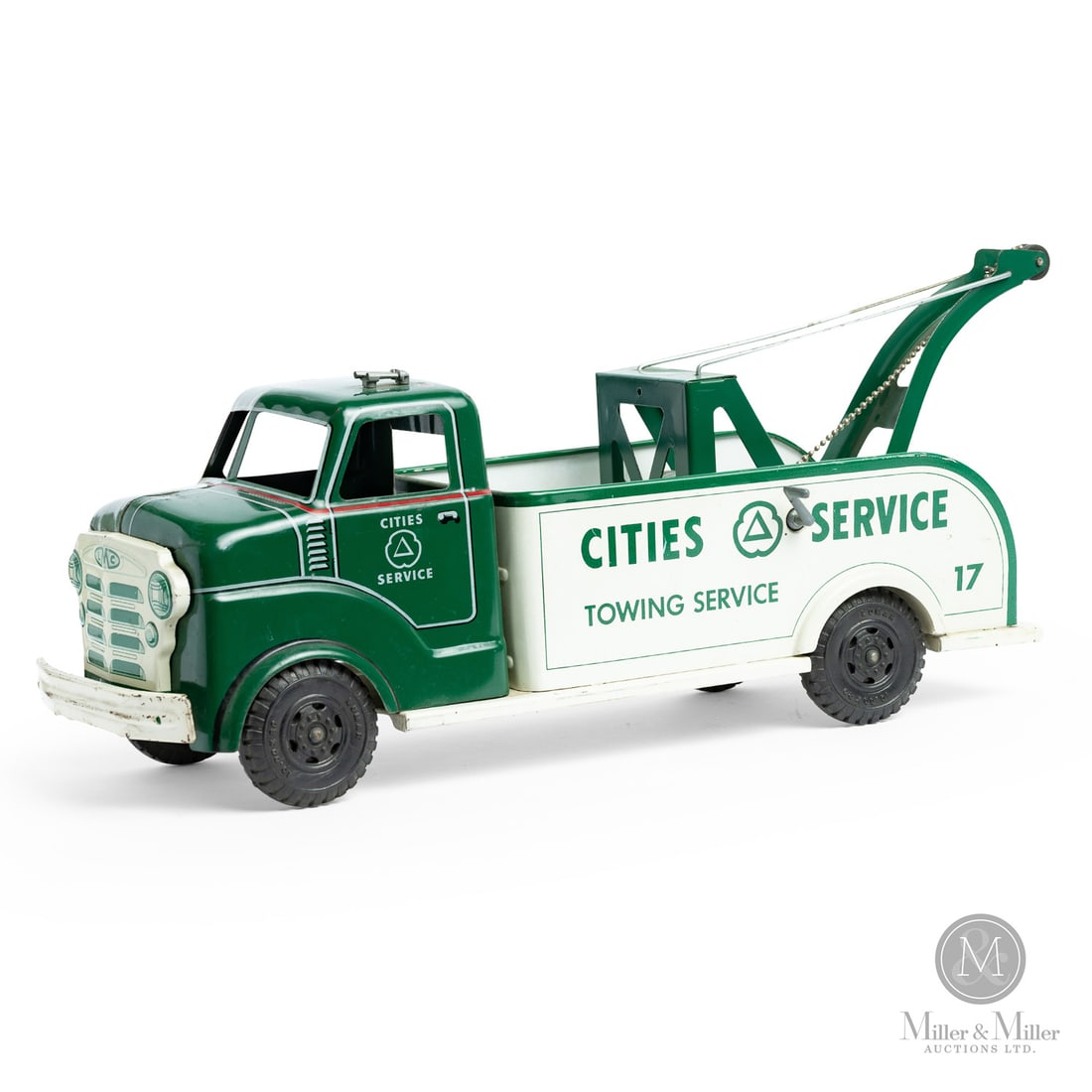 Marx Lumar Cities Service Tow Truck: AMerican. 1950s. Lithographed tin. The "Cities Service" tow truck was part of Marx's "licensed brand partnership" series of toys. Marx was known for its partnership with numerous companies, including