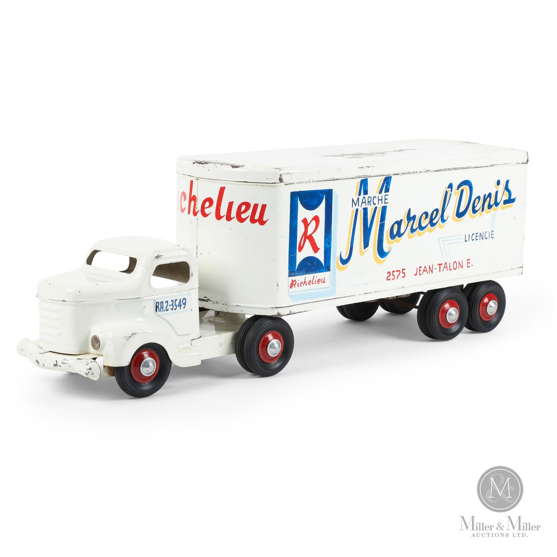 Otaco Minnitoys "Marcel Denis" Tractor Trailer: Canadian. 1950s. Pressed steel. This tractor-trailer was part of Otaco's "private-label" series of toys. These were promotional or display models made for specific companies and not intended for
