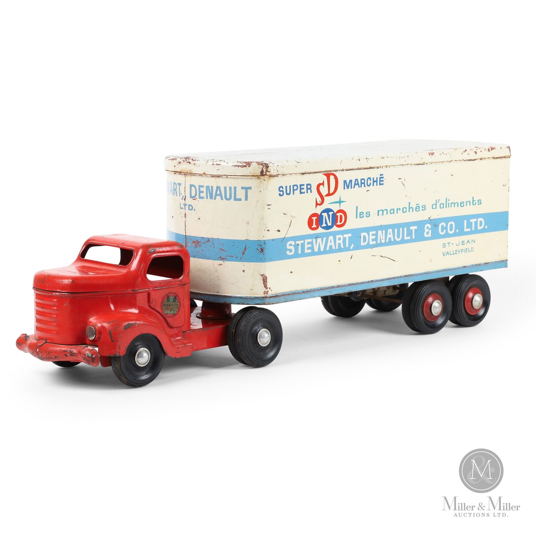 Otaco Minnitoys "Stewart, Denault & Co. Ltd." Tractor Trailer: Canadian. 1950s. Pressed steel. This tractor-trailer was part of Otaco's "private-label" series of toys. These were promotional or display models made for specific companies and not intended for