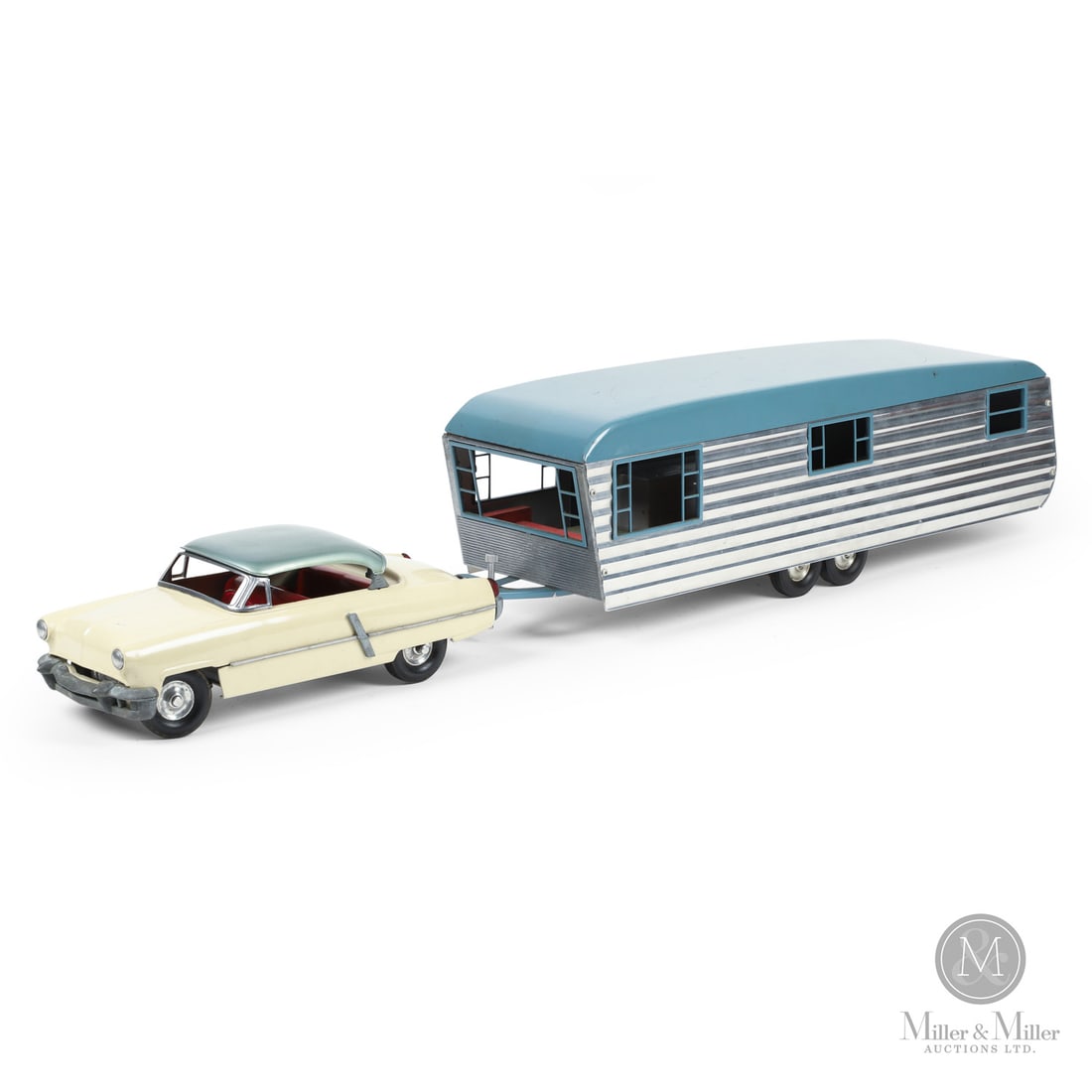 Miller-Ironson (Smith-Miller) MIC Lincoln Capri With Trailer: American. 1953-1954. Pressed steel, die-cast, aluminum. This is a rare toy produced by the Miller-Ironson Corp. ("MIC"), a company that was formed by Matt Miller when he left Smith-Miller in 1952.