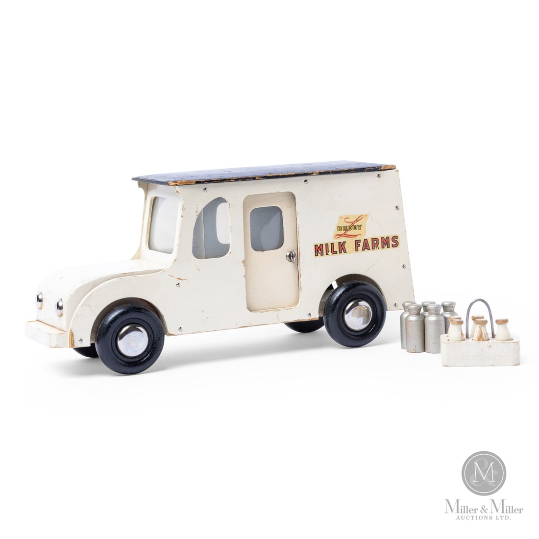 Buddy "L" Wooden "Milk Farms" Truck: American. 1944-1946. Wood with metal accessories and plastic windows. Wooden toys, such as this Buddy "L" Milk Farms truck, were sometimes referred to as "Buddy "L" Victory" toys, created when steel