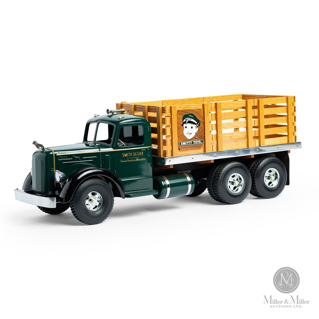 Fred Thompson Limited Edition Smith-Miller Smitty Toys L MACK Stake Truck (6/300): American. Late 1980s-early 1990s. Pressed steel. Fred Thompson was a long-time collector of Smith-Miller toys. In 1979, over 20 years after Smith-Miller ceased toy production, Thompson purchased the