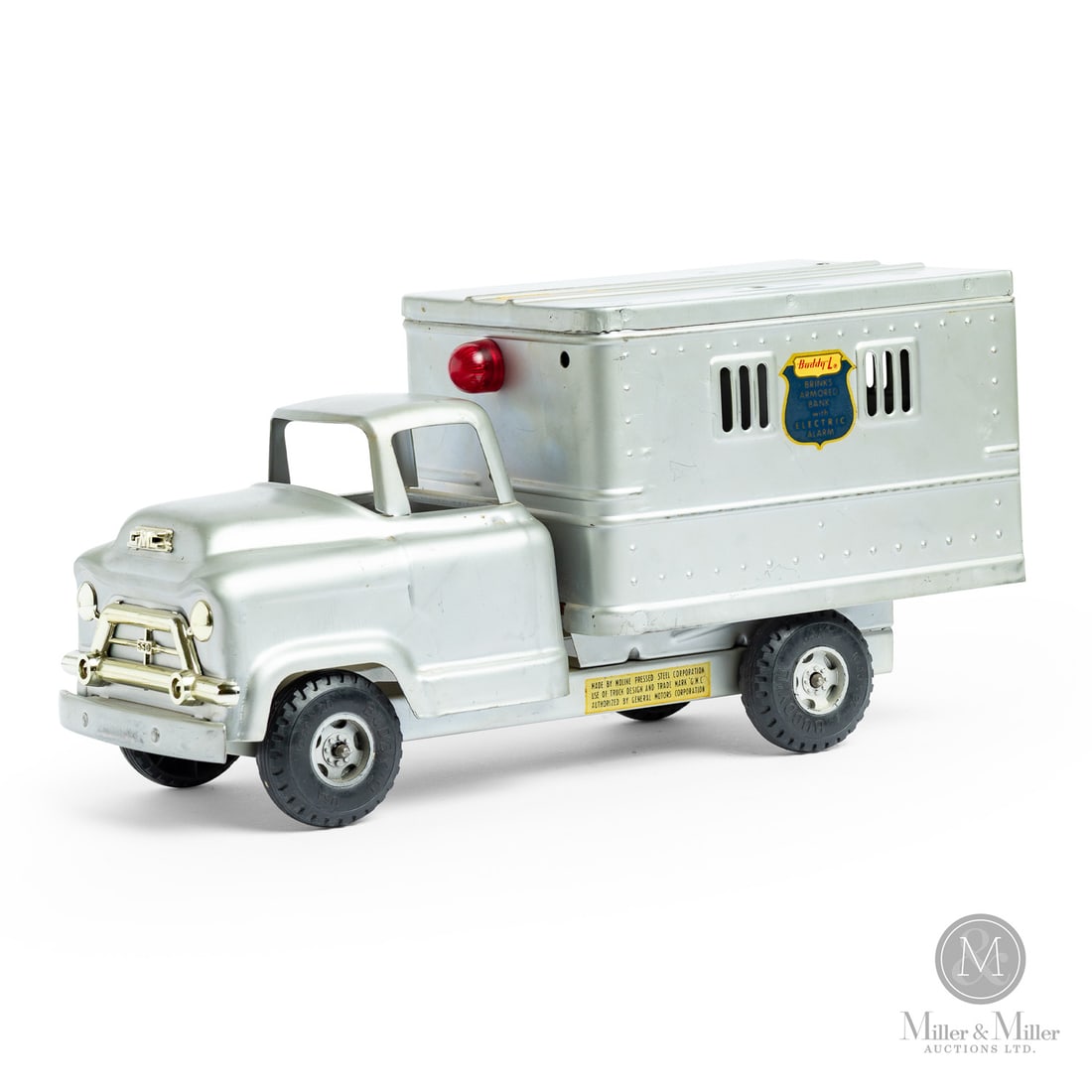 Buddy "L" Brinks Armored Truck: American. Late 1950s-mid 1960s. Pressed steel. This truck was originally sold as a bank. The top of the truck features a coin slot, allowing money to be inserted into the rear compartment, which