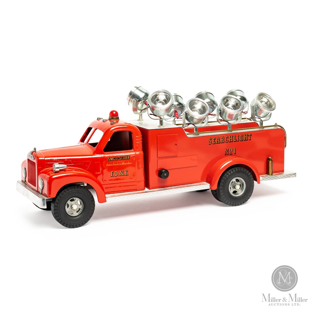 Fred Thompson Smith-Miller Limited Edition Mack B-Series F.D.N.Y. No. 1 Fire Truck (77/150): American. 1980s. Pressed steel, aluminum, brass. Fred Thompson was a long-time collector of Smith-Miller toys. In 1979, over 20 years after Smith-Miller ceased toy production, Thompson purchased the