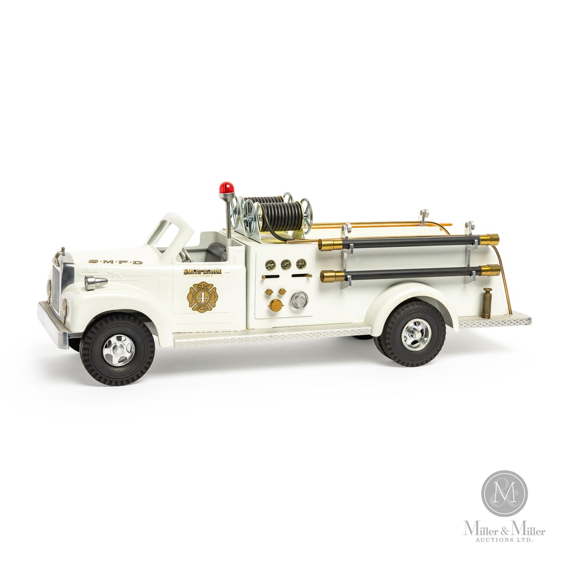 Fred Thompson Smith-Miller Limited Edition Mack B-Series S.M.F.D. No. 4 Fire Truck (95/115): American. 1980s. Pressed steel, aluminum, brass. Fred Thompson was a long-time collector of Smith-Miller toys. In 1979, over 20 years after Smith-Miller ceased toy production, Thompson purchased the