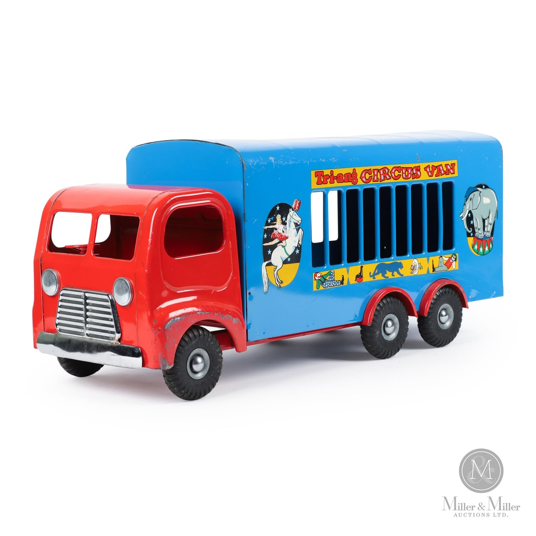 Tri-ang Circus Van: English. 1950s. Pressed steel. Decalled, "Tri-ang Made in England", on underside. Embossed, "Tri-Ang Made in England 01 LB Ltd.", on tires. From the Yvan Lalonde Collection.Size10" x 8" x