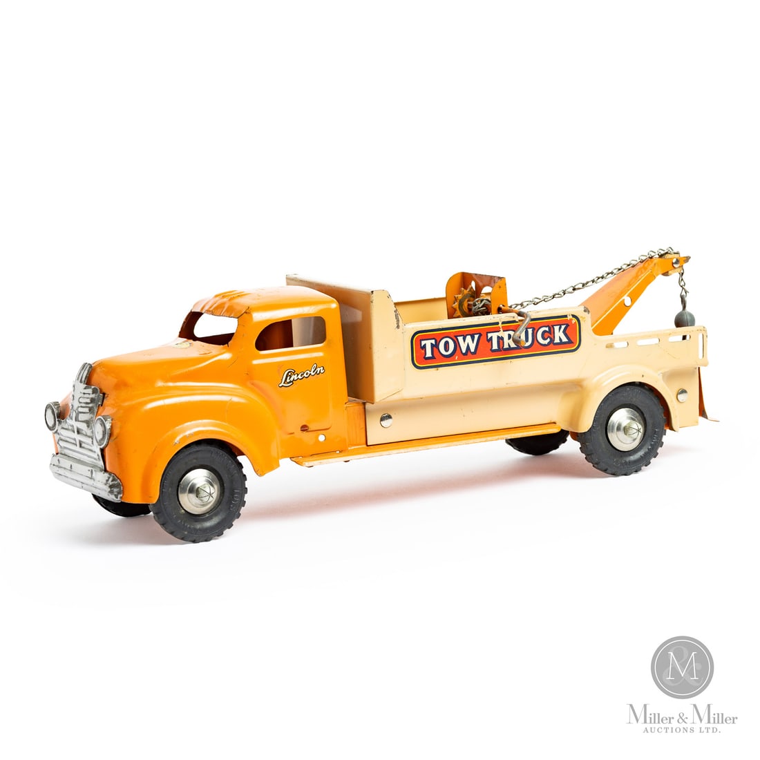Lincoln Toys Tow Truck: Canadian. 1946-early 1950s. Pressed steel. This toy has a decal that says "Made in Canada Lincoln Toys Reg'd," which identifies Lincoln toys that were made from 1946 to the early 1950s, representing t