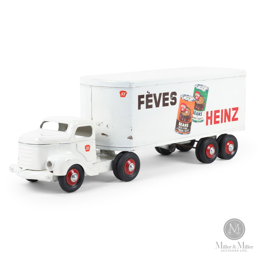 Otaco Minnitoys Bilingual "Heinz Beans" Tractor Trailer: Canadian. 1950s. Pressed steel. This tractor-trailer was part of Otaco's "private-label" series of toys. These were promotional or display models made for specific companies and not intended for
