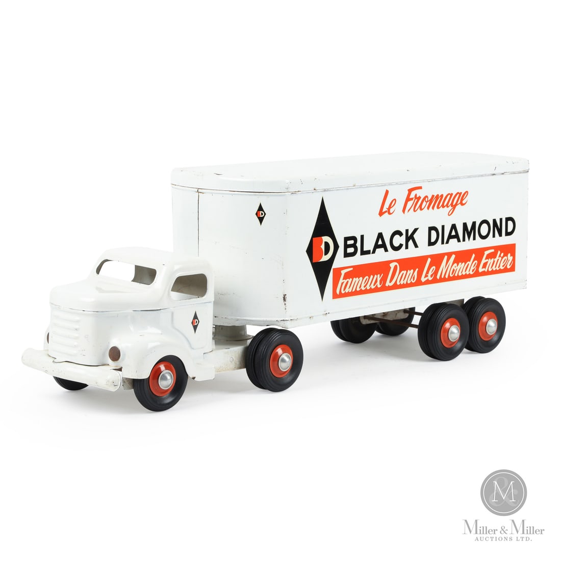 Otaco Minnitoys Bilingual "Black Diamond Cheese" Tractor Trailer: Canadian. 1950s. Pressed steel. This truck was part of Otaco's "private-label" series of toys. These were promotional or display models made for specific companies and not intended for retail sale. As