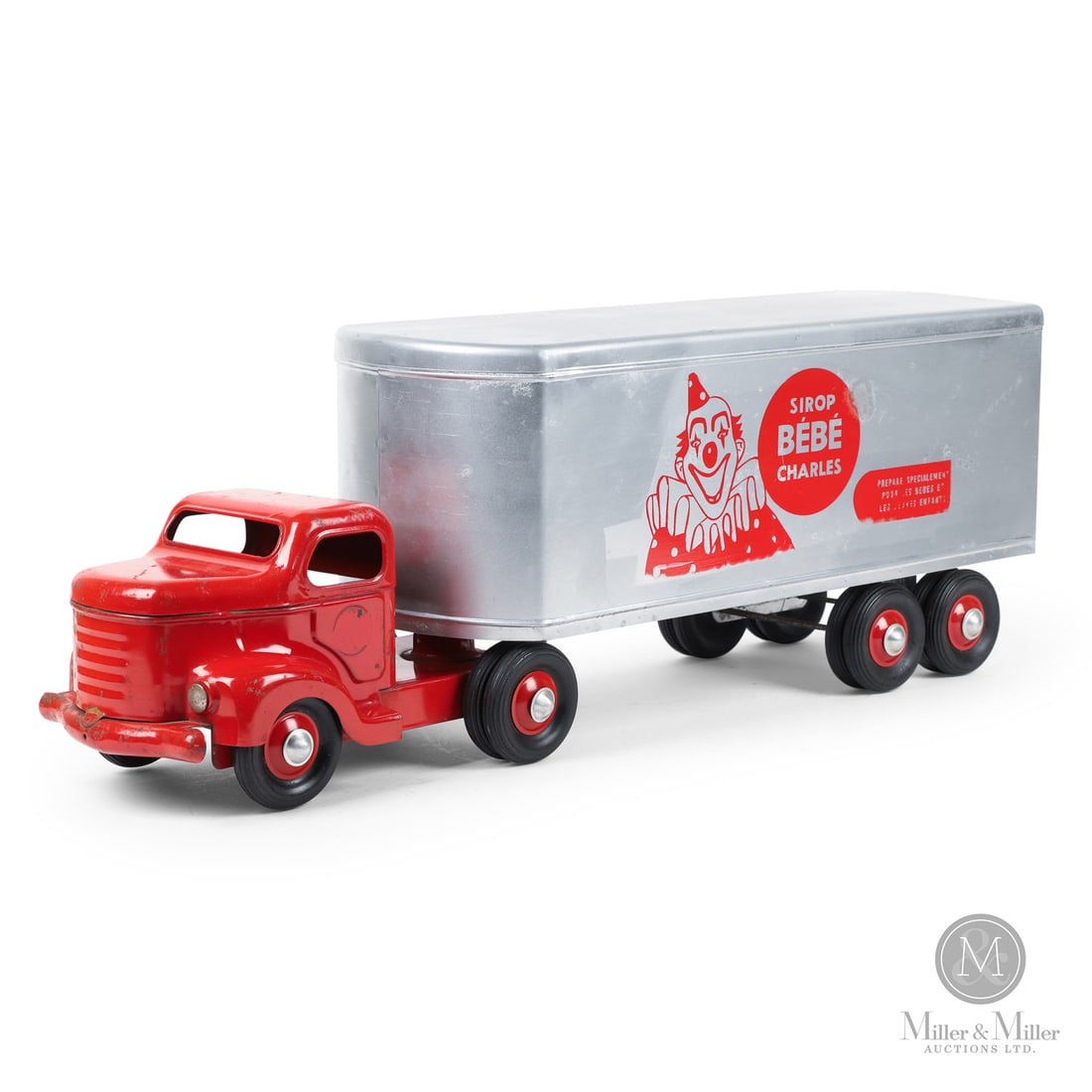 Otaco Minnitoys "Sirop Bebe Charles" Tractor Trailer: Canadian. 1950s. Pressed steel. The "Sirop Bebe Charles" (Charles Baby Syrup) tractor-trailer was part of Otaco's "private-label" series of toys. These were promotional or display models made for