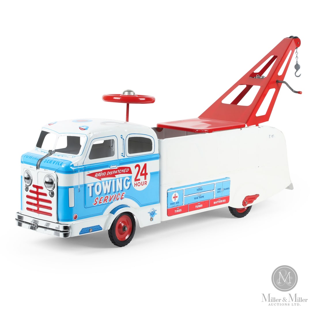 Marx Towing Service Wrecker Ride-on Tow Truck: American. 1959-1960s. Lithographed steel. Marked, with Marx trademarked logo, on passenger door. From the Yvan Lalonde Collection. Size 11" x 7" x 30". Removable hitch extends 8" in height. Condition