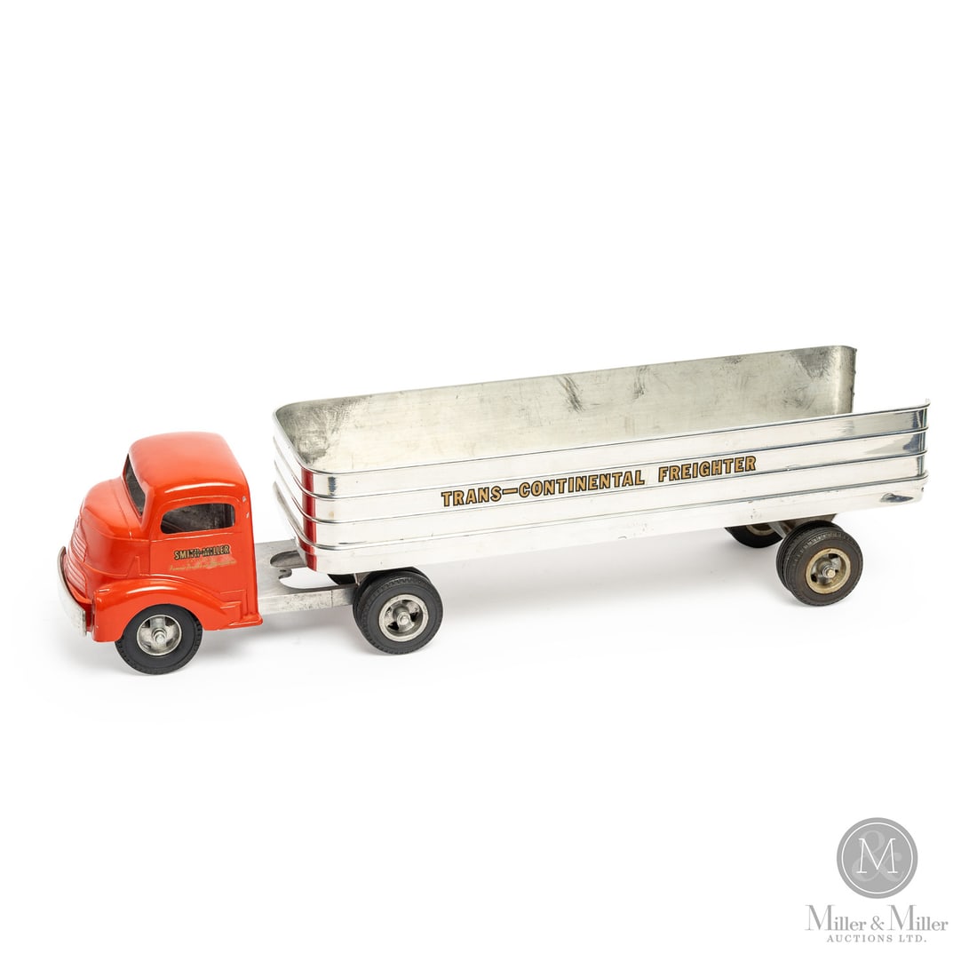 Smith-Miller Trans-Continental Freighter: American. Early 1950s. Pressed steel, die-cast aluminum. Embossed, "Smitty Toys Smith-Miller, Calif.", on underside. From the Yvan Lalonde Collection. Size 5" x 6" x 23". Condition Excellent condition