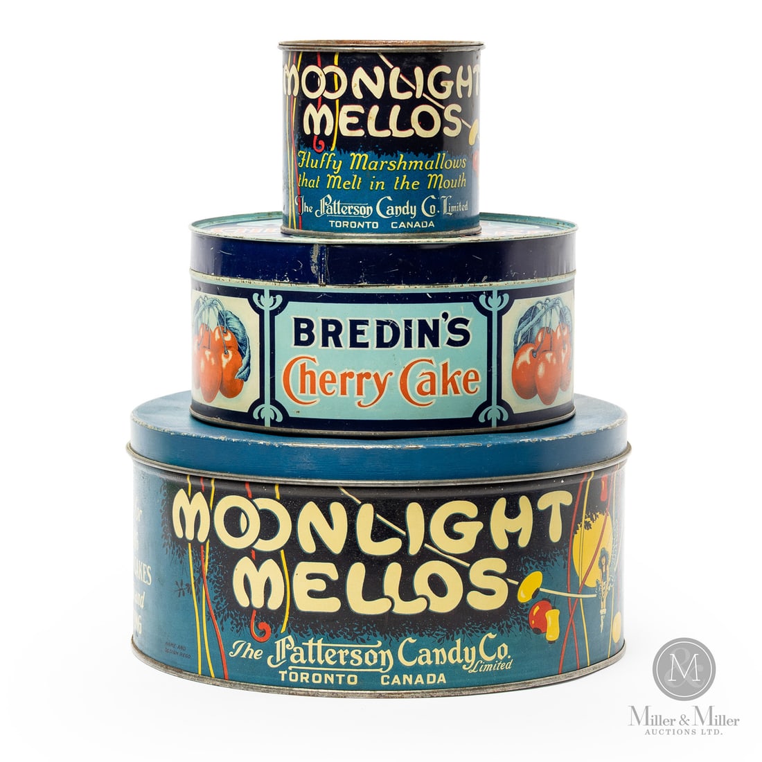 Moonlight Mellos and Bredin's Cherry Cake Tins: Canadian. 1930s. Lithographed tin. Cherry cake marked, "The Thos Davidson Mfg Co., Limited, Montreal", lower edge of lid. Moonlight Mellows tins marked, "Macdonald Mfg Co., Toronto". All items are