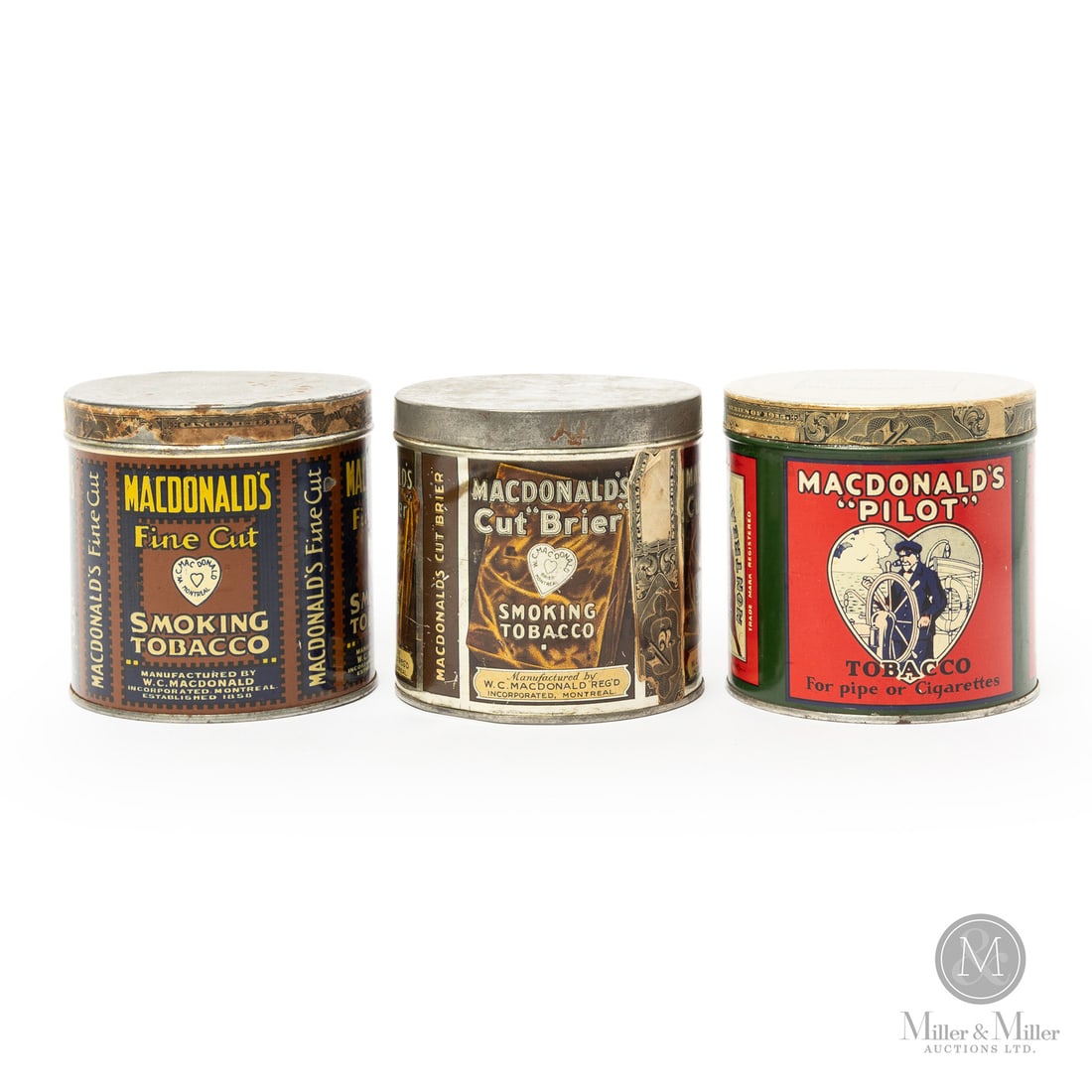 MacDonald's Pilot, Cut Brier and Fine Cut 1/2 Pound Tins: Canadian. 1930s. Lithographed tin. All items are guaranteed authentic by Miller & Miller Auctions. From the late Marcel Gallays Collection.SizeEach: 4" x 4".ConditionExcellent condition. All retain