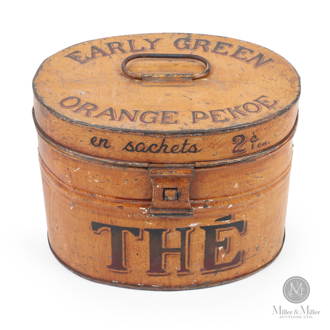 Early Green & Orange Pekoe Tea Toleware Advertising Tin: Canadian. 1890s. Painted tin. All items are guaranteed authentic by Miller & Miller Auctions.Size8” x 11” x 8”.ConditionRetains original stencilled surface with appropriate wear to
