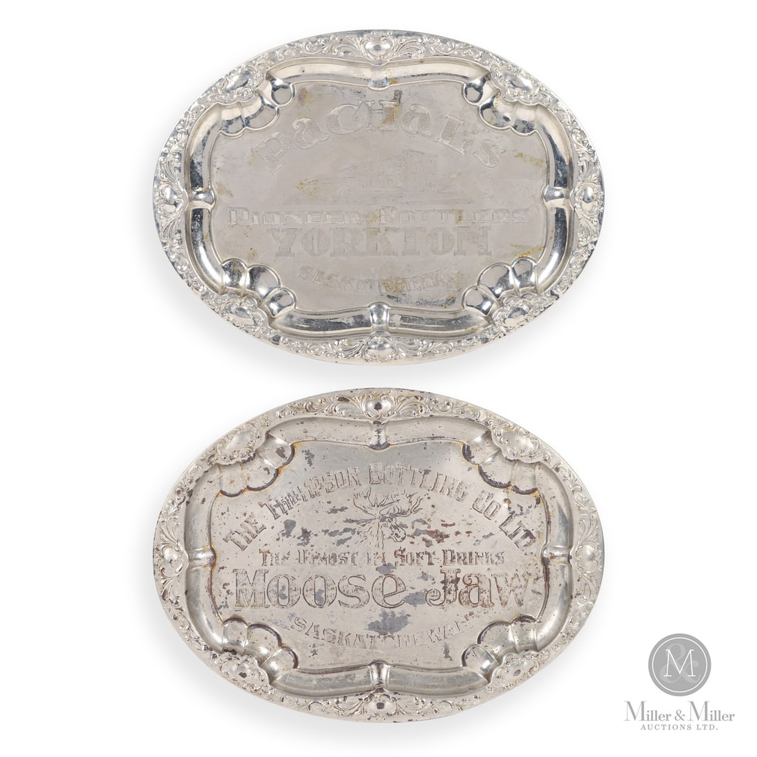 Thompson Bottling Co. Ltd. and Pachal's Saskatchewan Serving Trays: Canadian. 1900s. Nickel-plated copper. Marked, "Made in England Reg'd No. 536797", under Saskatchewan script. All items are guaranteed authentic by Miller & Miller Auctions. From the late Marcel