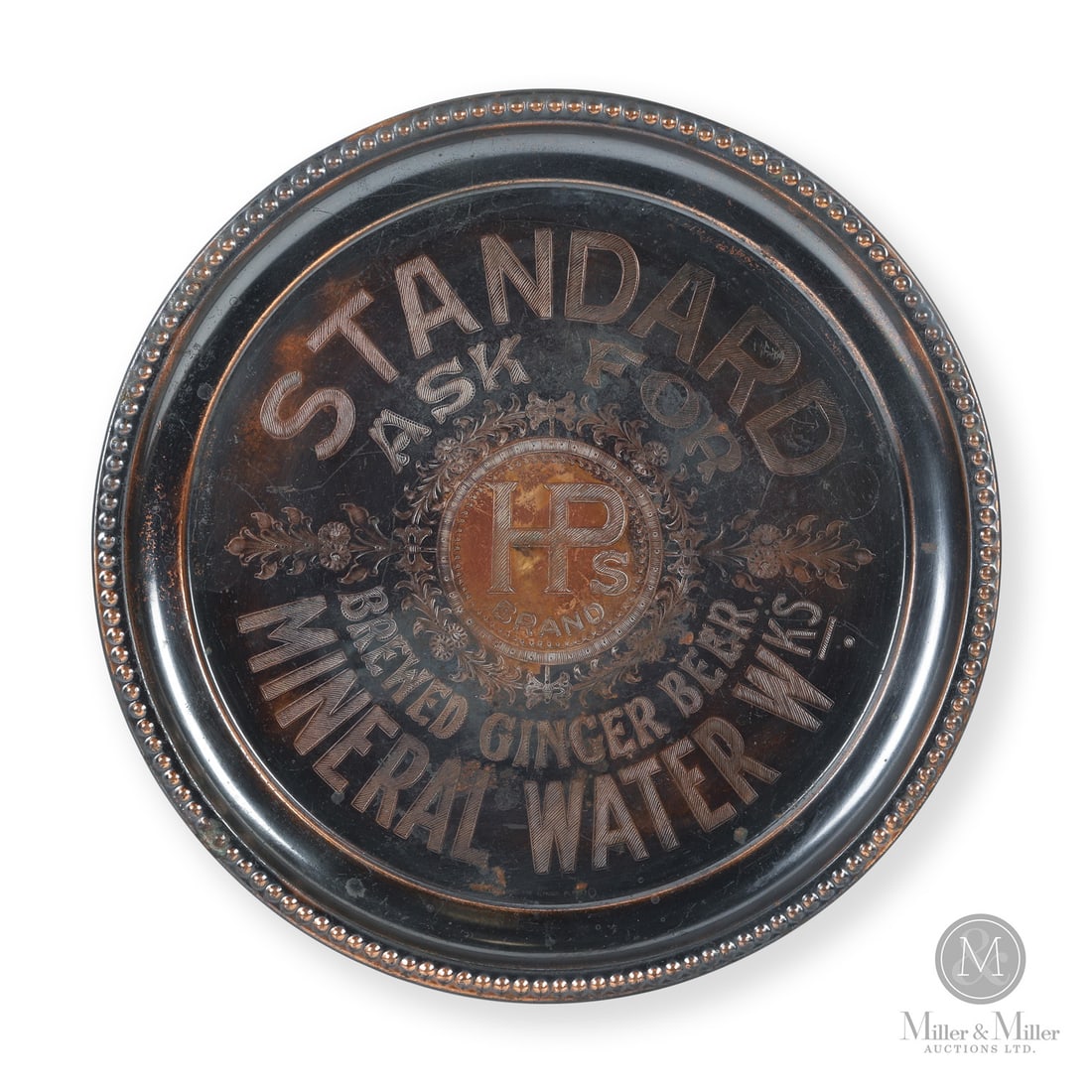 HP's Brand, Saskatchewan Ginger Beer and Mineral Water Serving Tray: Made in England for the Canadian market. 1910s. Nickel-plated copper. HP's brand of soda waters and ginger beers were manufactured in North Battleford, Saskatchewan. Marked, "Made in England", lower