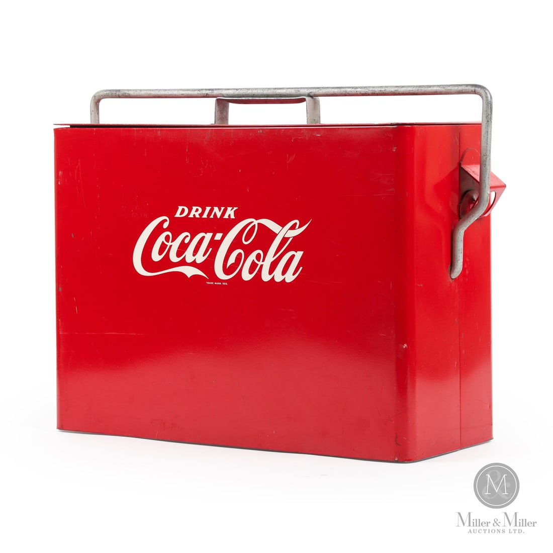 Coca-Cola "Airline" Cooler: Canada. 1953. Painted metal. The "airline" cooler was so-called for its slim profile and single top handle. This permitted them to be carried and stowed exactly like a piece of luggage, to fit within