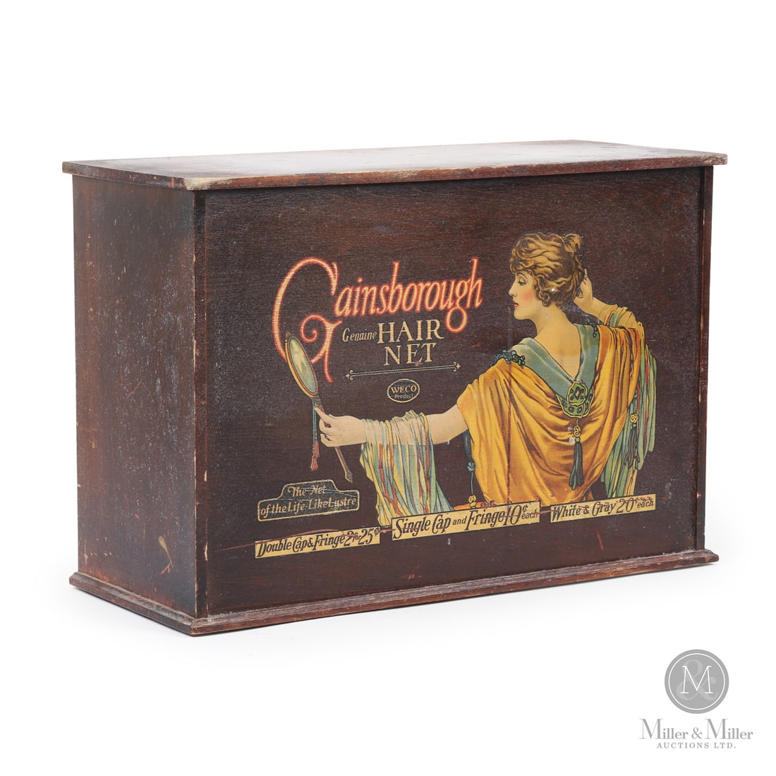Gainsborough Hair Nets Store Display Cabinet: American. 1920s. Wood with screened image on customer-facing side. Untouched original condition. Minor nicks to edges. Retains original assortment strip on reverse. Light crazing to finish. 12" x 17"