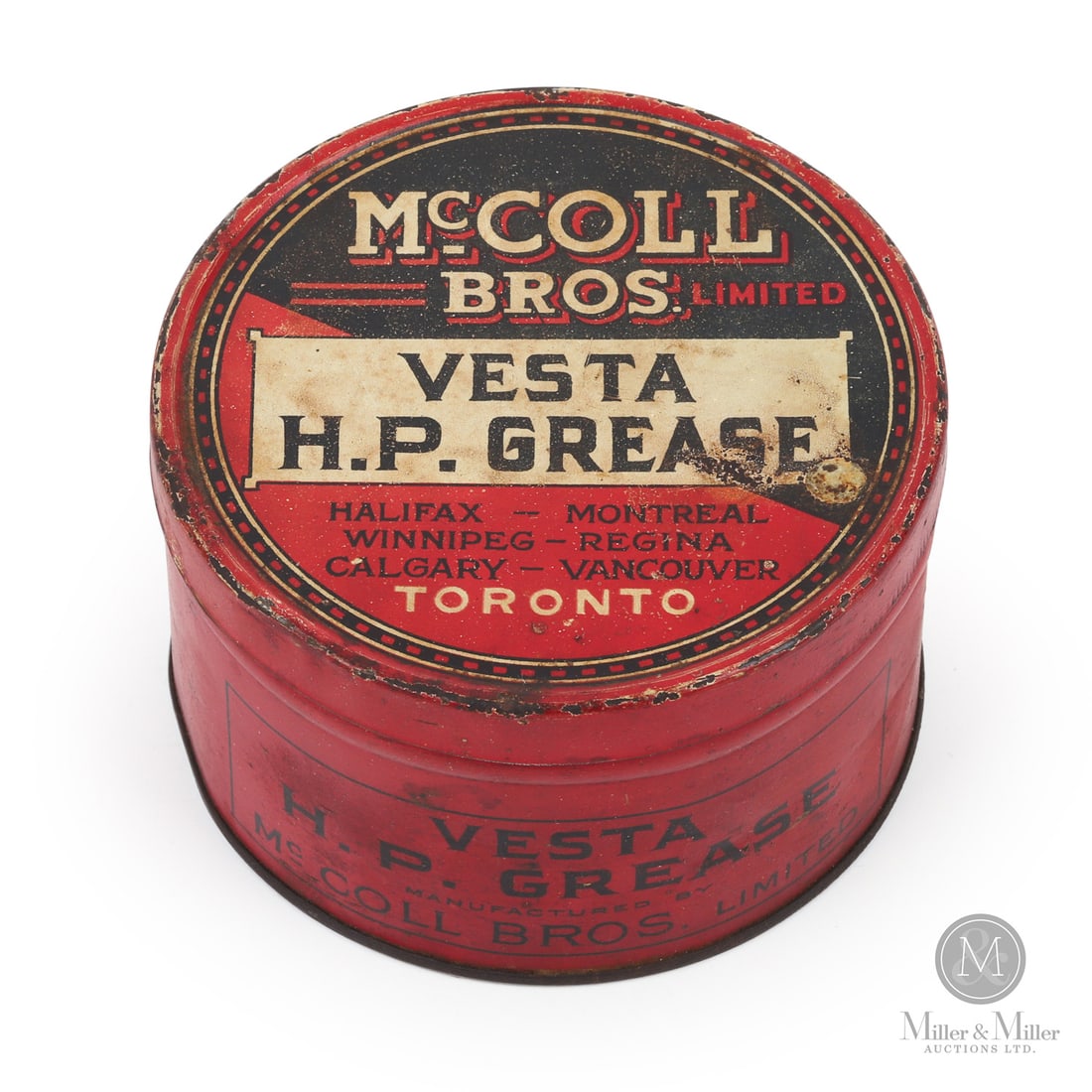 Early McColl Bros Vesta H.P. Grease Tin: Canadian. 1920s. Lithographed tin. Marked, "Macdonald Mfg Co. Limited, Toronto", edge of lid. 2.5" x 4.25" x 4.25". Authenticated by The Authentication Company (TAC #501473). All items are guaranteed