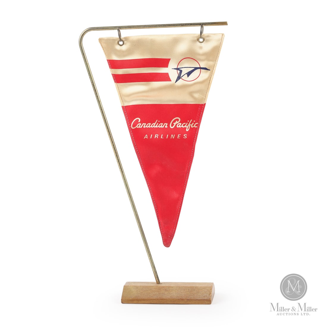 Canadian Pacific Airlines Tabletop Pennant: Canadian. 1950s. Stitched fabric. Features the classic "Canadian Pacific Airlines" script in white against a red background, a hallmark of the airline's identity before its 1968 rebranding to "CP Air"