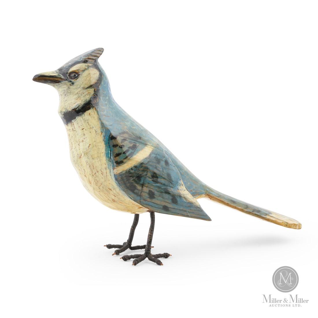 Yvon Cote Blue Jay: Quebec, Canada. c. 1975. Wood. A Blue Jay carved by Yvon Cote (1914-1995) in original colour. Unmarked. 5" x 2" x 7.5". From the Late Miller Carmichael Collection. Quebec, Canada. c. 1975. A Blue Jay