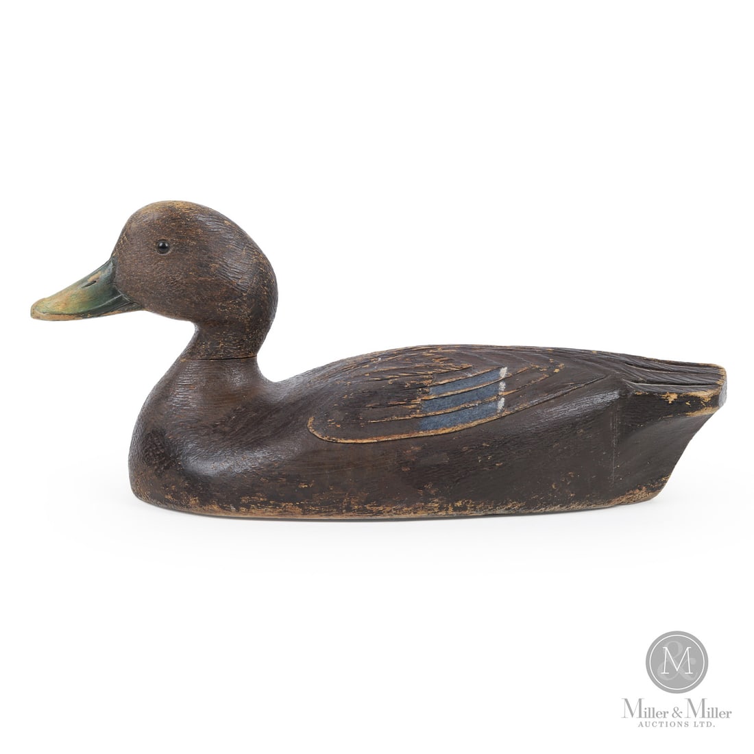 Bill Cooper (1886-1975) Verdun Quebec Black Duck Decoy: Verdun, Quebec. Second quarter 20th century. Painted wood. Stamped, "Clayton TR 6449", underneath. 6.5" x 15" x 6.25". From the Late Miller Carmichael Collection. Verdun, Quebec. Second quarter 20th c