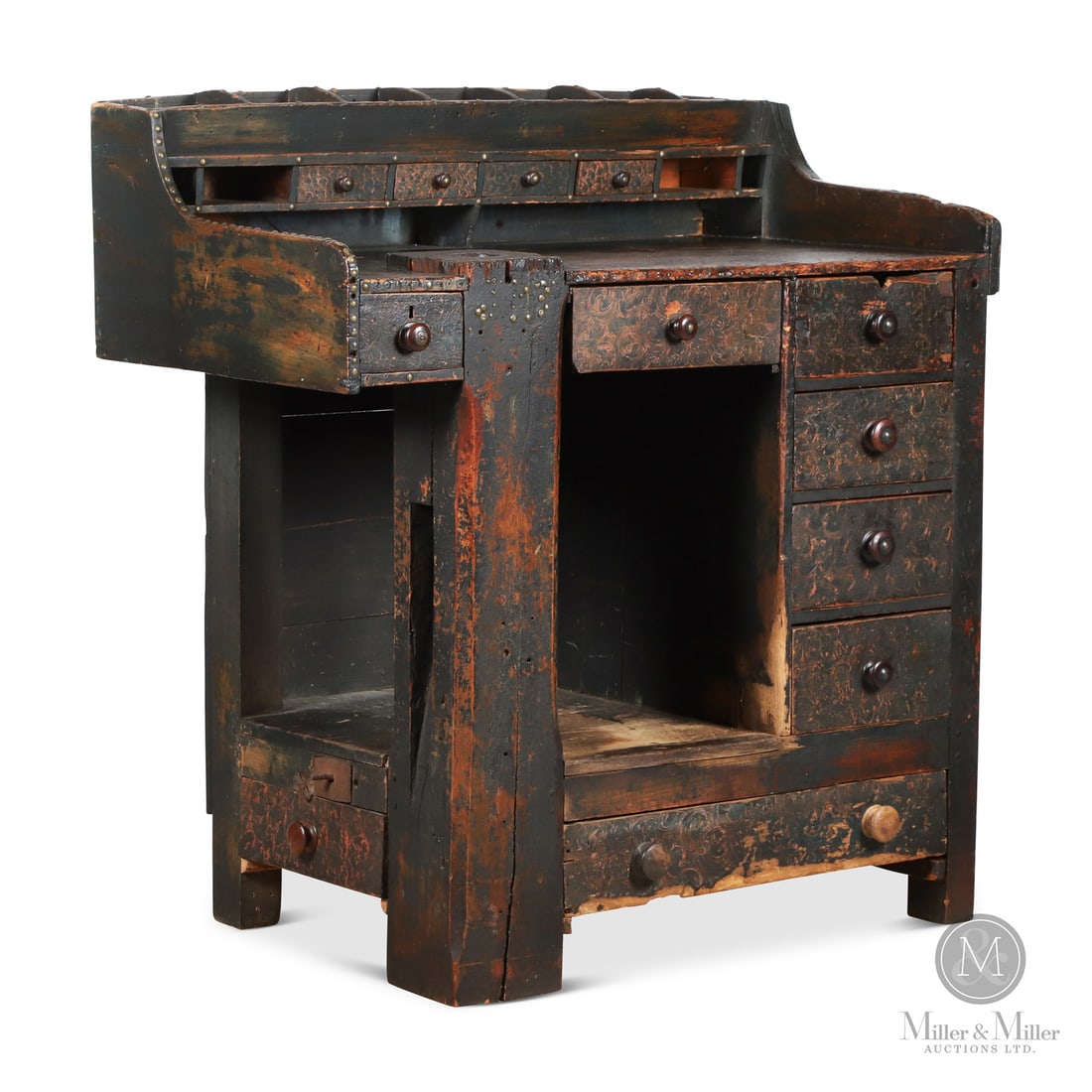 Upright Cobbler's Bench: Elmira, Ontario, Canada. Mid 19th Century. Wood. An exceptional upright cobbler's bench in dark oxidized blue paint with sponged motifs on the multiple drawers and decorative brass tacks along the