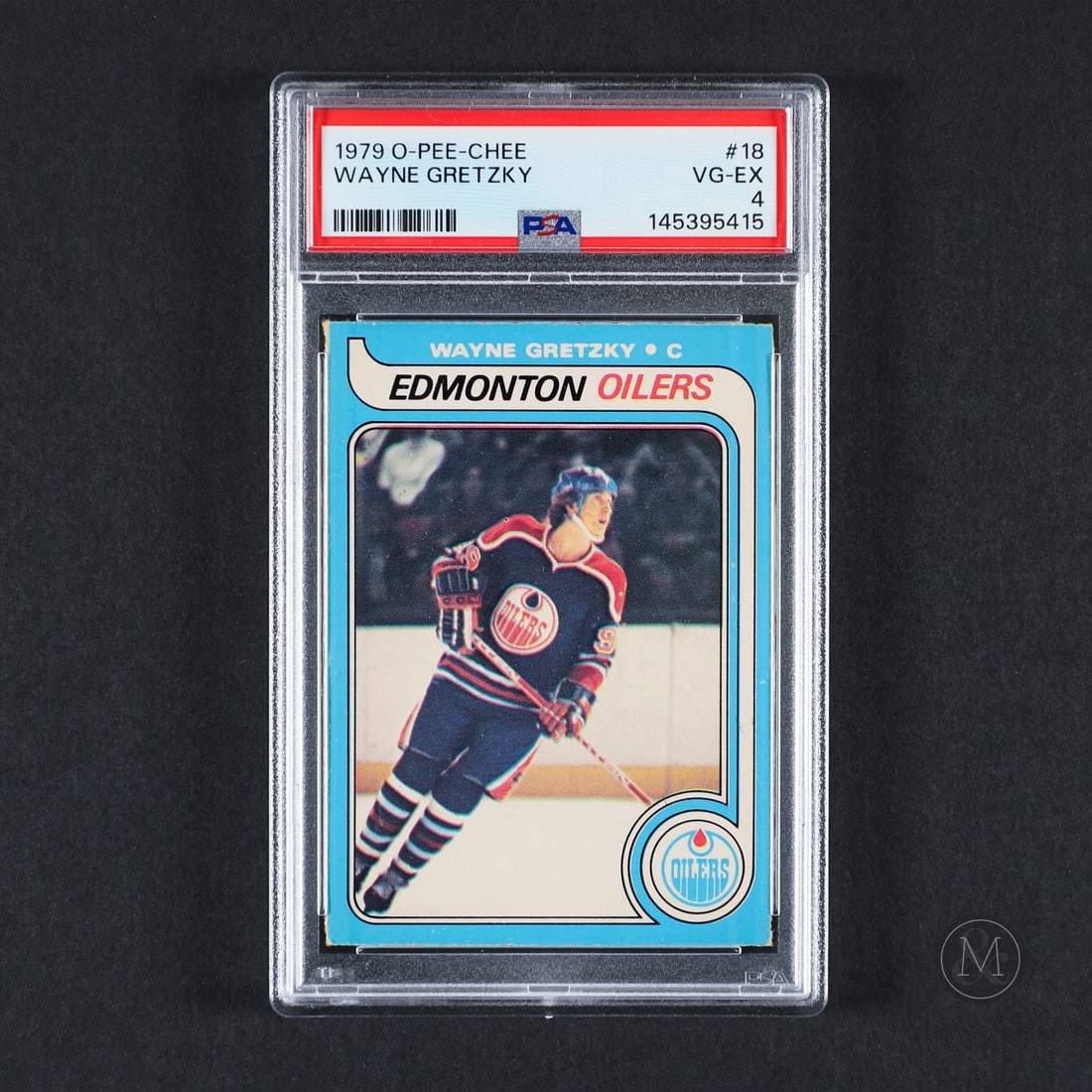 1979-1980 O-Pee-Chee #18 Wayne Gretzky (PSA 4 VG-EX): An excellent reverse skate line example, this 1979-1980 O-Pee-Chee Wayne Gretzky Rookie Card is a superb example. Gretzky's rookie is one of the most iconic and highly sought-after cards in hockey