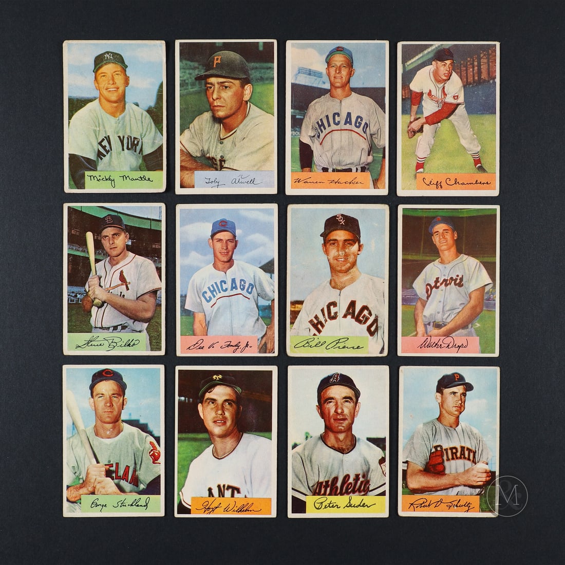 1954 Bowman Baseball Grouping w/ Mantle (12): The 1954 Bowman baseball grouping of 12 cards offered here is highlighted by card #65, Mickey Mantle. Also included in the group are cards #7, 36, 57 (Hoyt Wilhelm), 59, 99, 102, 123, 125, 126, 173,