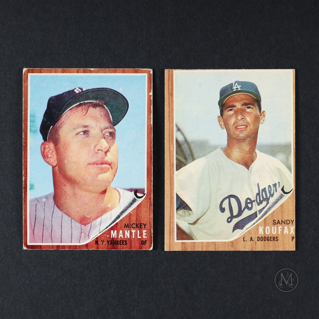 1962 Topps #5 Koufax and #200 Mantle: Offered here are two key examples from the 1962 Topps baseball set: Mickey Mantle and Sandy Koufax. All items are guaranteed authentic by Miller & Miller Auctions. Size 3.5" x 2.5". Condition Mantle