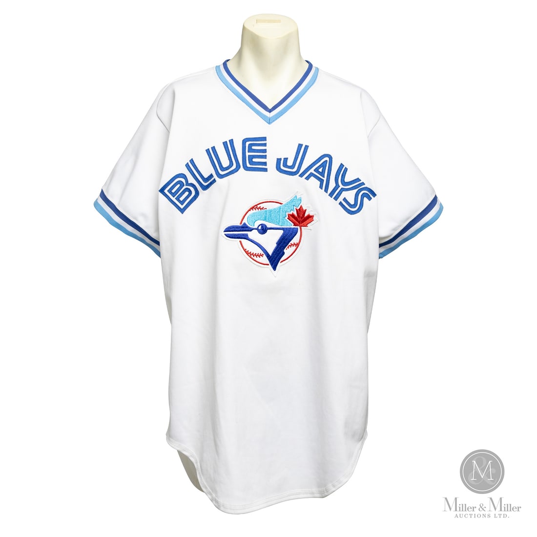 1988 David Wells Game Used Jersey: This 1988 David Wells Toronto Blue Jays game-worn home jersey represents a piece of franchise history from the early years of the left-hander's legendary 21-season career. The pullover white garment