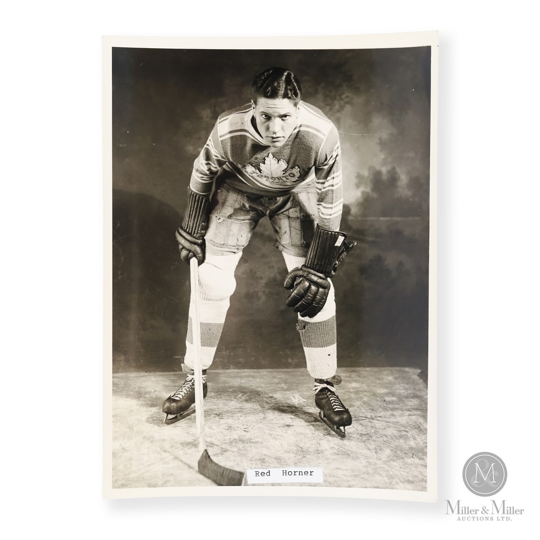Red Horner Alexandra Studios Photo: Horner played his entire NHL career with Toronto from 1928 to 1940, appearing in over 500 games and serving as team captain for several seasons. He was a key part of the Maple Leafs’ 1932