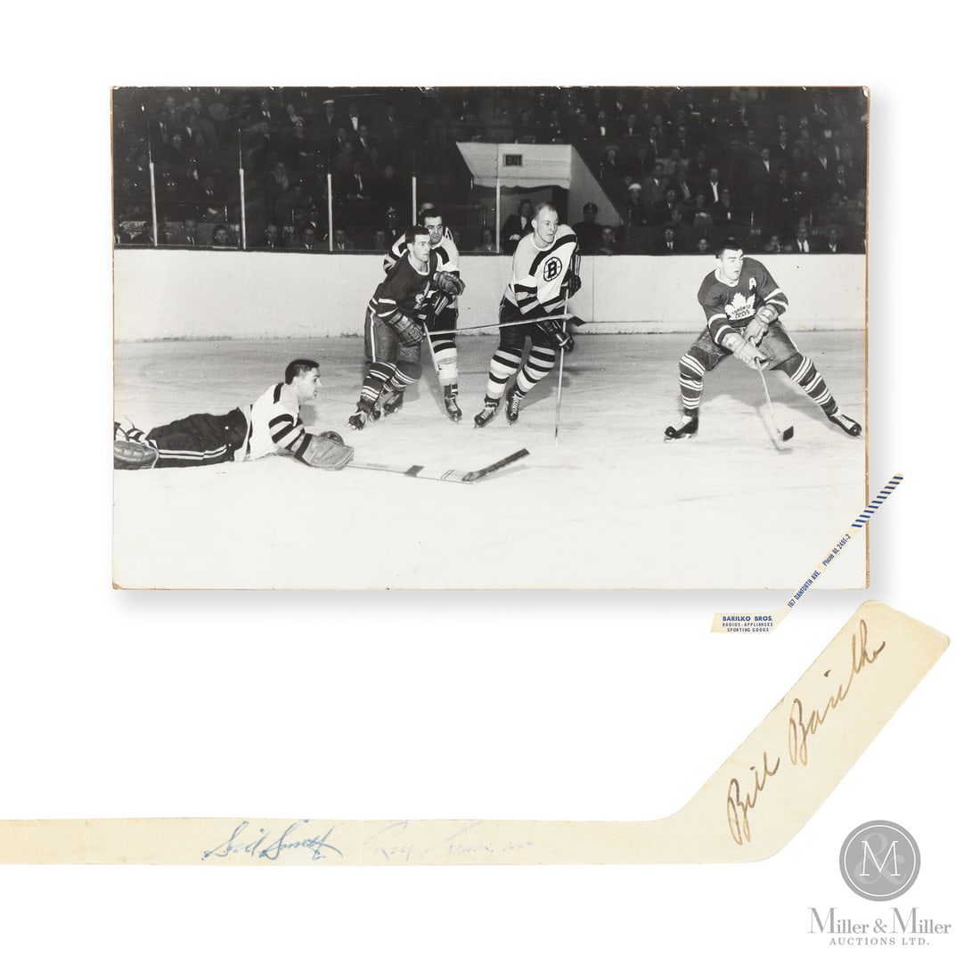 Barilko Bros Radio and Appliances Barilko Signed Mini Stick w/ Display Photo: Bill Barilko will go down as one of Toronto Sports' most iconic figures, and this mini stick provides a unique connection to the Toronto Sports legend. When Barilko was not scoring goals for the