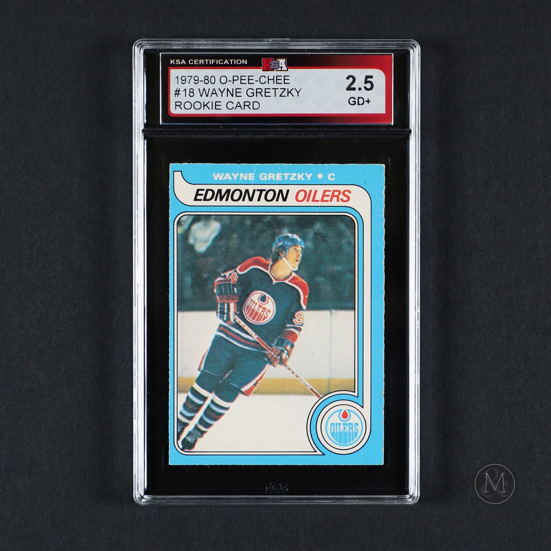 1979-1980 O-Pee-Chee #18 Wayne Gretzky (KSA 2.5 GD+): The 1979-1980 O-Pee-Chee Wayne Gretzky Rookie Card is one of the most iconic and highly sought-after cards in hockey history. Featuring "The Great One" in his Edmonton Oilers uniform, this card marks