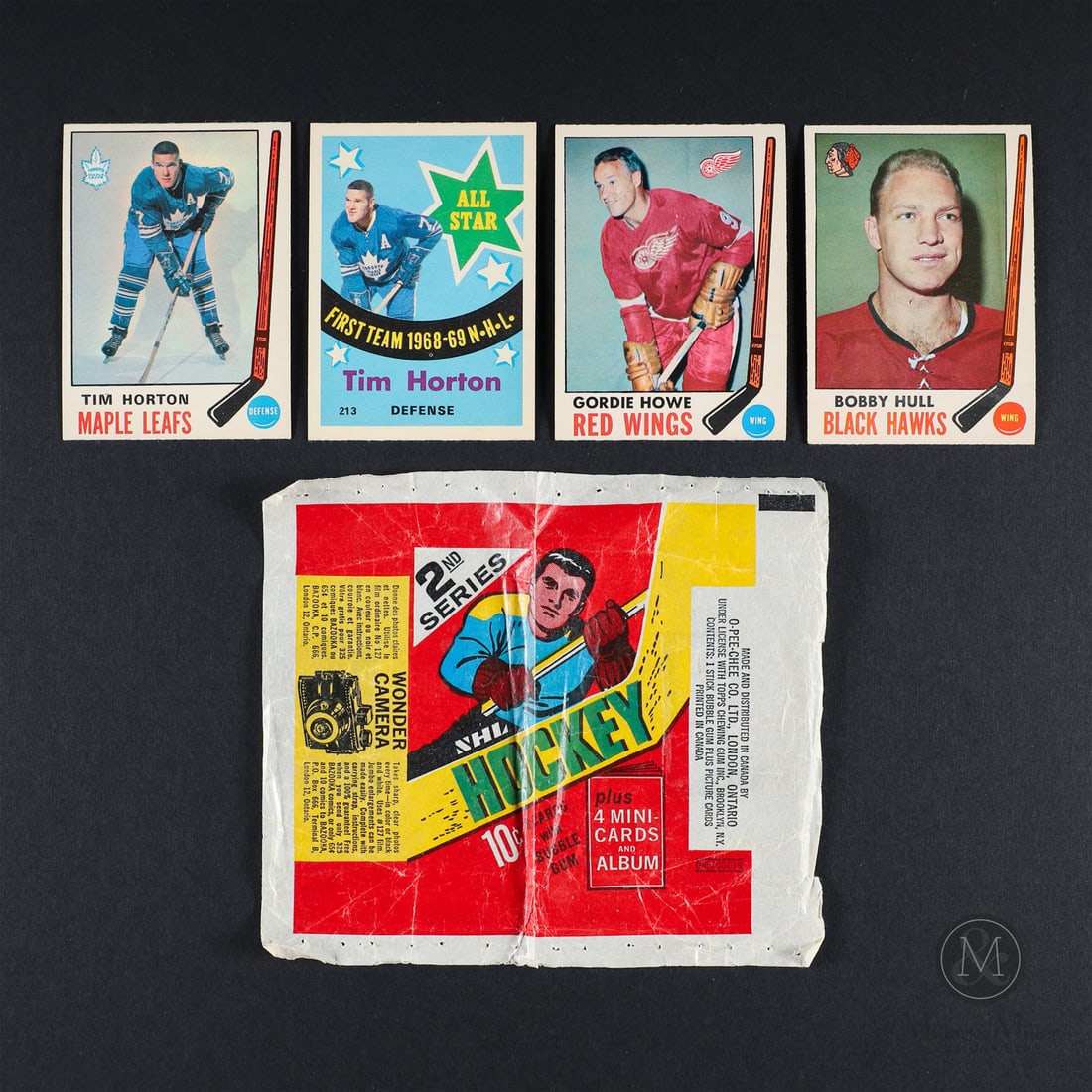 1969-1970 O-Pee-Chee Hockey Grouping (99/232 w/ Inserts): The 1969-1970 O-Pee-Chee hockey group offered here includes 99/232 cards in the set, along with 8 of the stamp booklet inserts and a 2nd Series Wax Wrapper. Notably, the group includes card #182