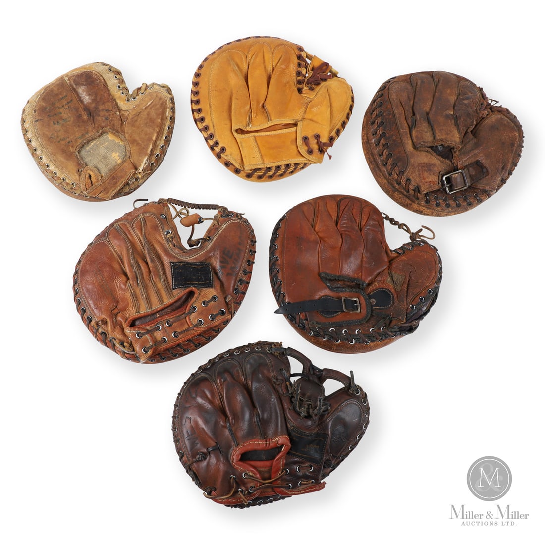 Early Baseball Catchers Gloves (6): Included in this group are six early baseball catcher's gloves. In many cases, the palm wear leads to markings being illegible. The models include: Wilson (Leather etched 'West-2'), Reach 100, Smoky