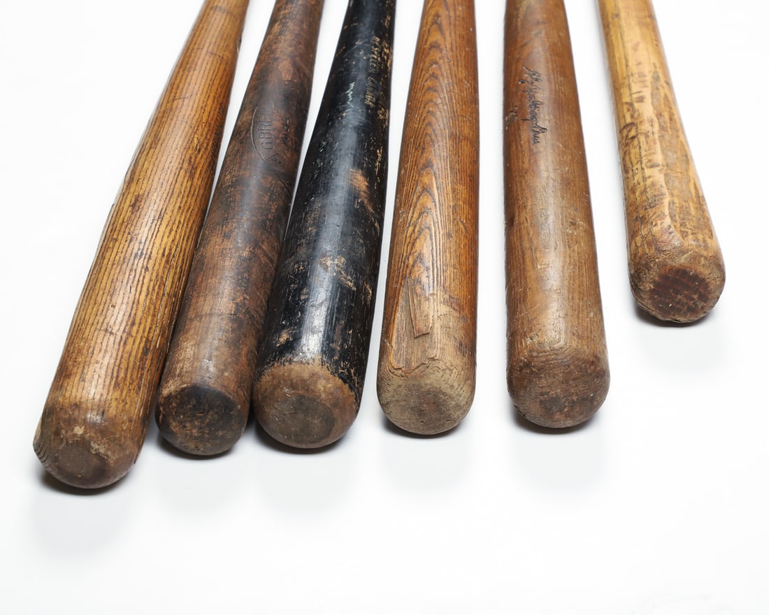 Early Baseball Mitts and Bats (12) - 17