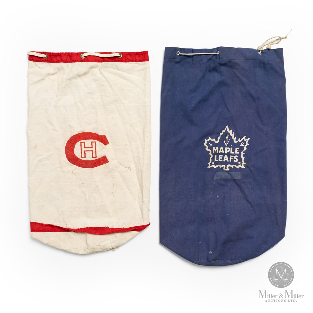 1950s Toronto and Montreal Laundry/Tote Bags: Excellent early examples, this pair of tote bags would have been available for purchase at arena shops for young fans of the 1950s. The pair offered here features the Toronto Maple Leafs and Montreal