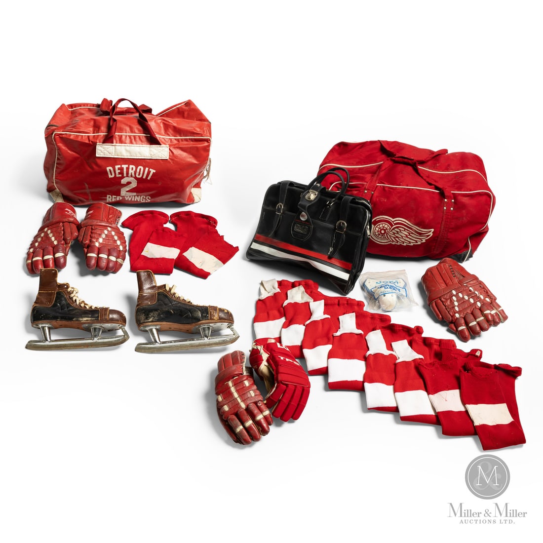 Gary Bergman Game Used Equipment and Bags: This assortment of Detroit Red Wings memorabilia belonged to and was used by Gary Bergman, the legendary Detroit Red Wing and 1972 Team Canada Summit Series member. The collection includes two primary