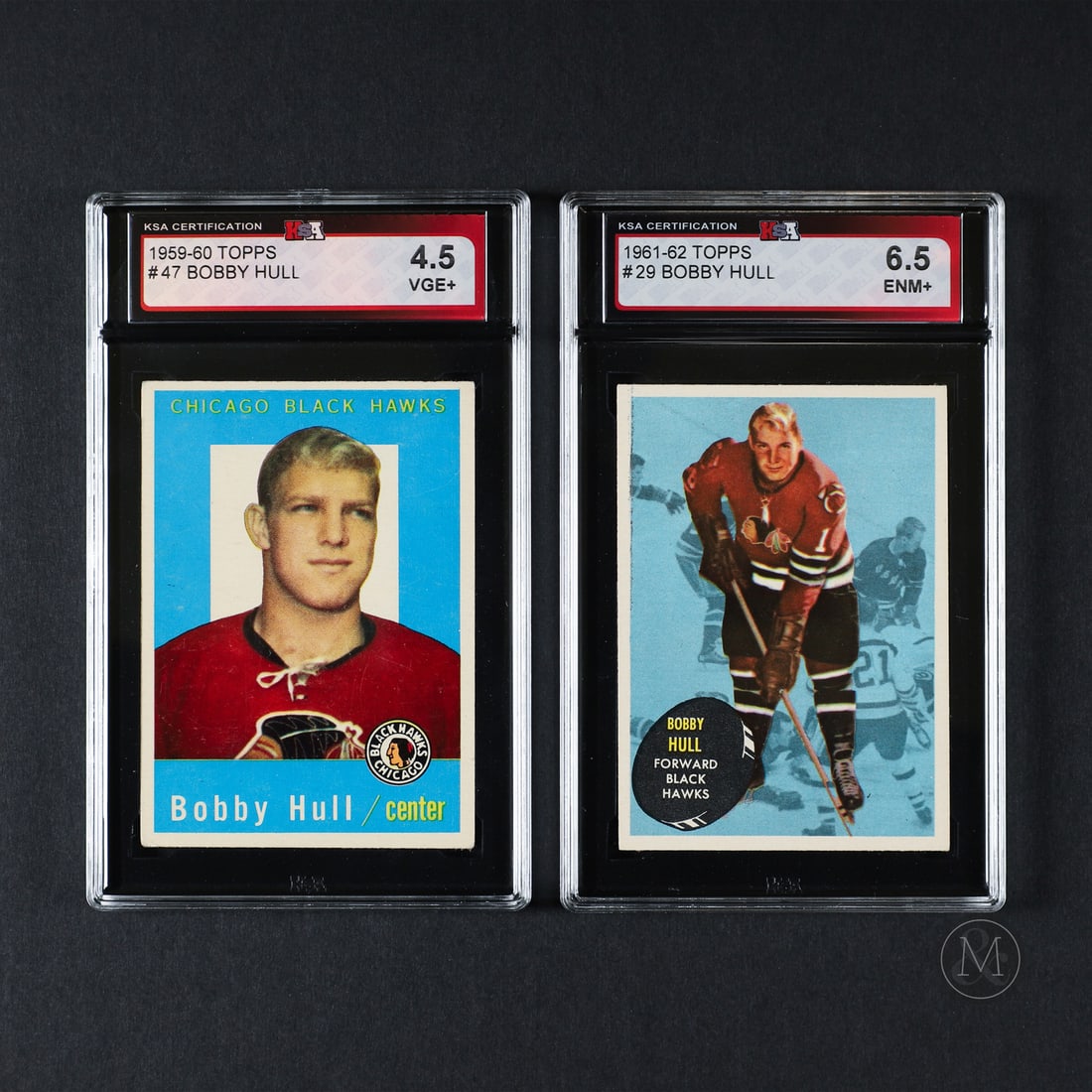 1959 and 1961 Topps Bobby Hull (KSA 4.5 and 6.5): Offered here is a pair of Bobby Hull cards from the 1959 and 1961 Topps sets. All items are guaranteed authentic by Miller & Miller Auctions. Size 5.5" x 3.5". Condition Both cards are recently graded