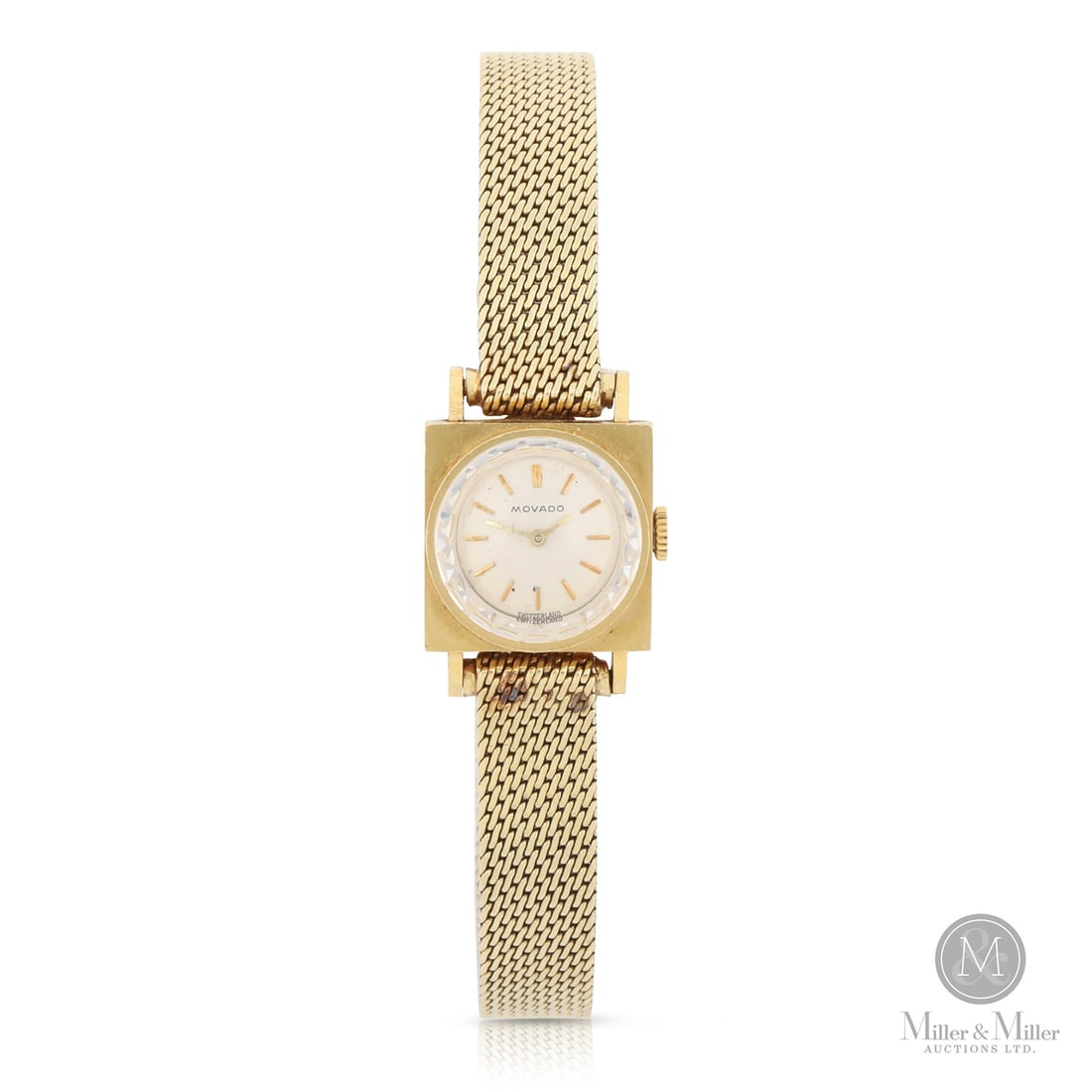 Movado, 14K "Cocktail' Wristwatch: Swiss. 14K yellow gold. This Movado Cocktail Watch is an mid-century timepiece crafted in 14k yellow gold. The watch features an integrated Milanese mesh bracelet, renowned for its supple, fabric-like